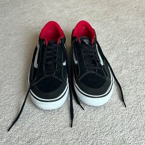 Black and red Vans